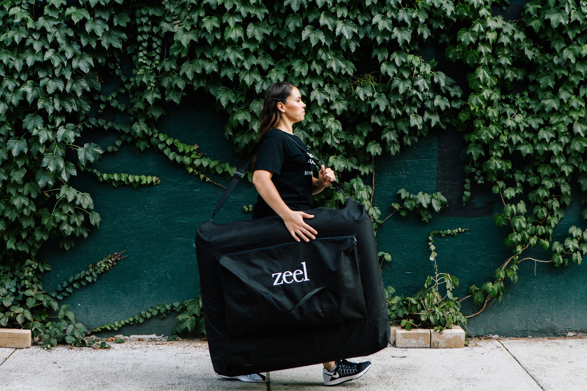 zeel bag, woman walking 